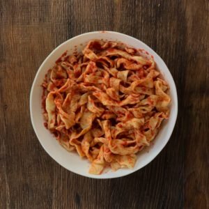 Homemade Tagliatelle with tomato sauce for family dinner